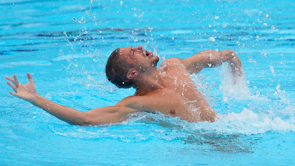 FILE - Italy's Giorgio Minisini competes during men's solo free final event at the European Aquatics Championships in Belgrade, Serbia, Thursday, June 13, 2024. With no men picked to compete in artistic swimming at the Paris Olympics, where they are eligible for the first time, a former world champion is ending his career this week. At the Italian national championships, four-time worlds gold medalist Giorgio Minsini is competing for the last time at age 28. 

 - (AP Photo/Darko Bandic, File)
